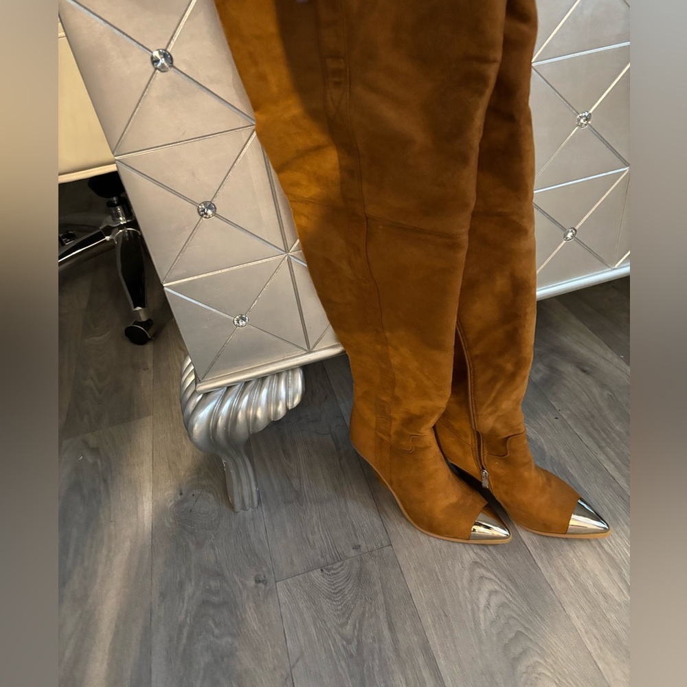 Thigh high cow girl style boot with metal gold toe